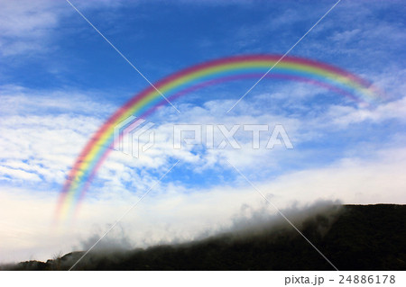 雨上がりの虹と青空 合成のイラスト素材