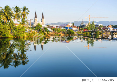 River view and Catholic church. 24887705