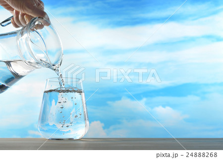 Fresh and clean drinking water in jug and glass 24888268