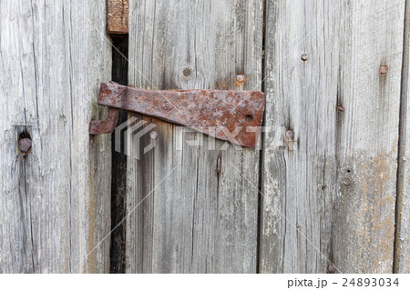 Old rusty hinge 24893034