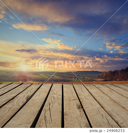 mountain landscape and empty wooden deck table mountain landscape and empty wooden deck table 24906253
