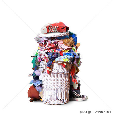 White straw basket full of dirty Laundry White straw basket full of dirty Laundry 24907164