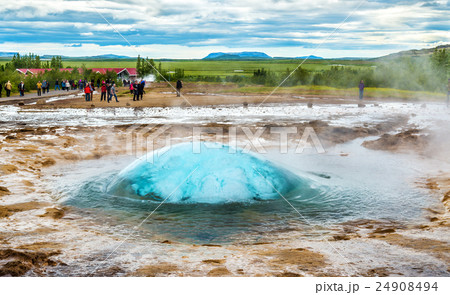 Strokkur geyser about to erupt Strokkur geyser about to erupt 24908494