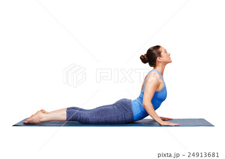 Sporty fit yogini woman practices yoga asana 24913681