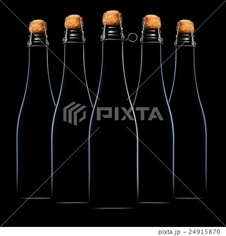 Set of beer bottles isolated on black background 24915870