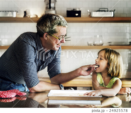 Father Daughter Helping Cookng Bakery Concept 24925578
