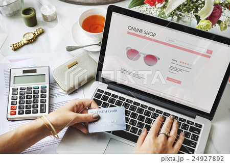 E-shopping Online Shopaholic Paying Credit Card Concept E-shopping Online Shopaholic Paying Credit Card Concept 24927892