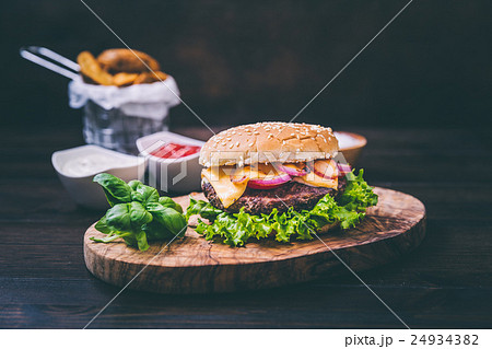 Burger with potato wedges 24934382