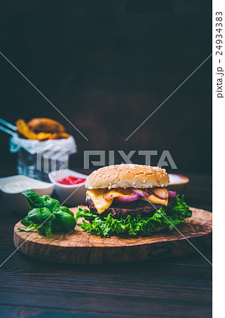 Burger with potato wedges 24934383