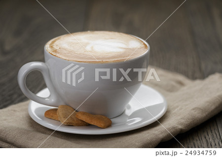 cup of cappuccino with home cookies cup of cappuccino with home cookies 24934759