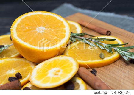 Orange fruit on brown wooden background 24936520