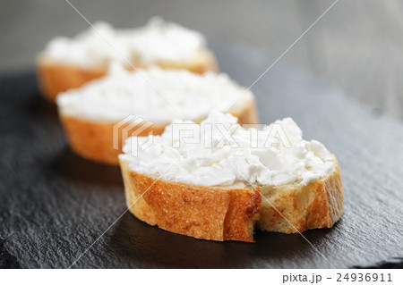 crunchy baguette slices with cream cheese crunchy baguette slices with cream cheese 24936911