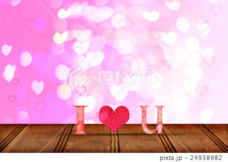 Love word wooden texture on blur bokeh background 24938982