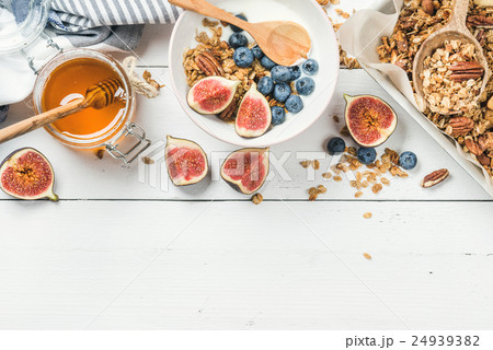 Healthy breakfast set on white wooden background 24939382