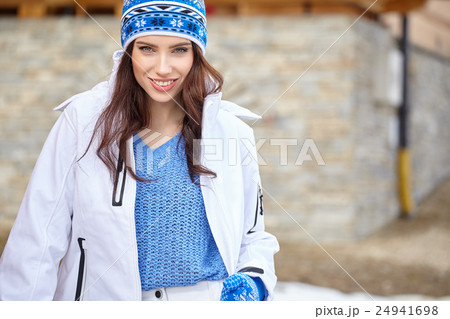 woman in a winter sweater and cap woman in a winter sweater and cap 24941698