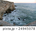 Sea coast in winter with clouds and waves 24945078