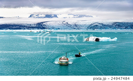 Boats in Jokulsarlon glacier lagoon - Iceland 24947484