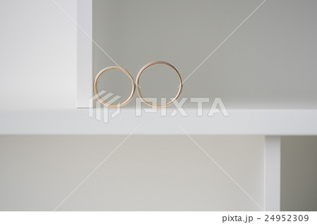 Two wedding rings on a white background.. Mr. and 24952309