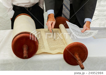 Hand of boy reading the Jewish Tora Hand of boy reading the Jewish Tora 24952994