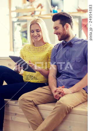 happy creative team with tablet pc in office 24954383