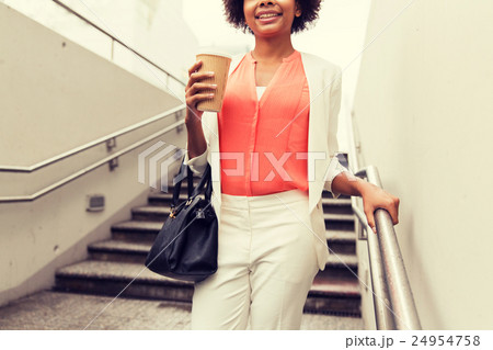 close up of african businesswoman with coffee 24954758