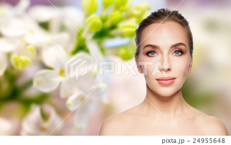 beautiful young woman face over white background 24955648