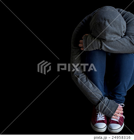 close up of person hiding her face 24958316