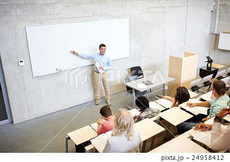 group of students and teacher at lecture group of students and teacher at lecture 24958412