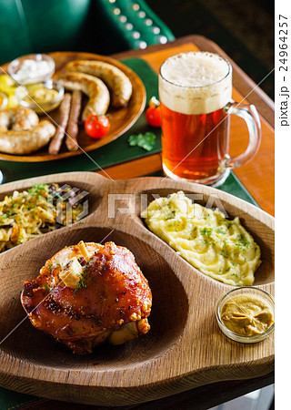 eisbein with braised cabbage, salad and beer eisbein with braised cabbage, salad and beer 24964257