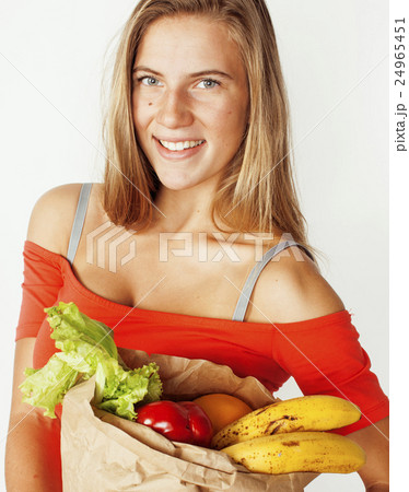 young pretty blond woman at shopping with food in 24965451