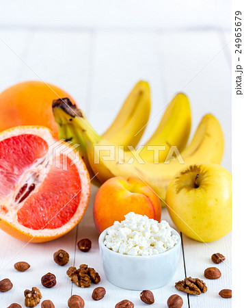 dieting cottage cheese with fresh fruits and nuts dieting cottage cheese with fresh fruits and nuts 24965679
