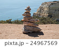 Stone pyramid at the sea 24967569