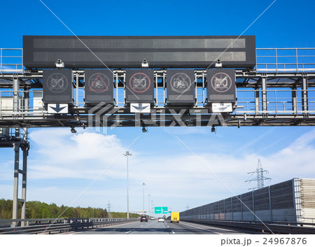 Traffic enforcement cameras over traffic lanes 24967876