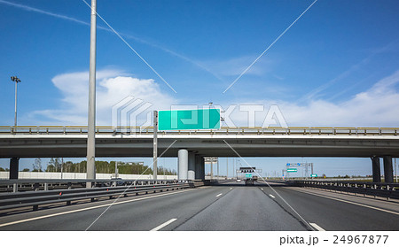 Green information banner over the road Green information banner over the road 24967877