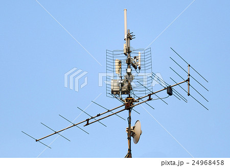 antenna and wi-fi transmitter on the roof antenna and wi-fi transmitter on the roof 24968458