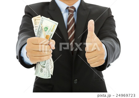businessman clench us dollars and thumb up 24969723