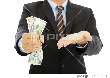 businessman clench us dollars and gesture 24969724
