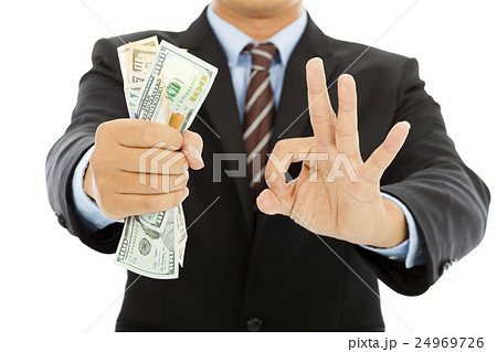 businessman grasp us dollars with ok gesture 24969726