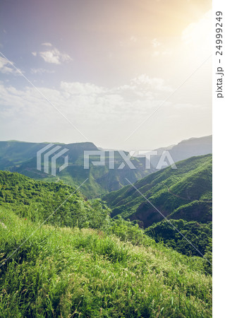 landscape with mountains and sky in sunset 24999249