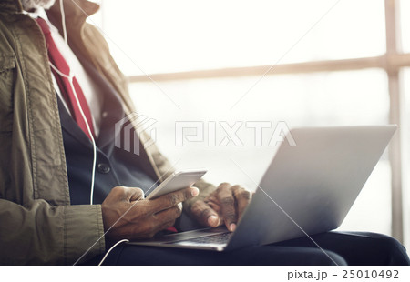 Businessman Using Laptop Mobile Sitting Concept 25010492
