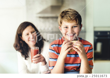 Mother Giving Food Son Concept Mother Giving Food Son Concept 25011673