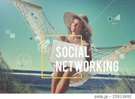 Beautiful Woman Sitting on a Hammock by the Beach 25013692