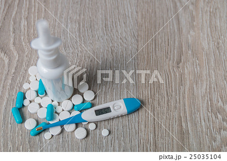 Blue and white medication, nasal spray 25035104