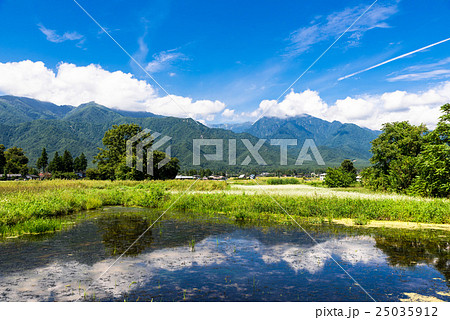 秋の信州 安曇野の田園風景と北アルプスの写真素材 [25035912] - PIXTA