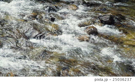 A River Flows Over Rocks 25036237