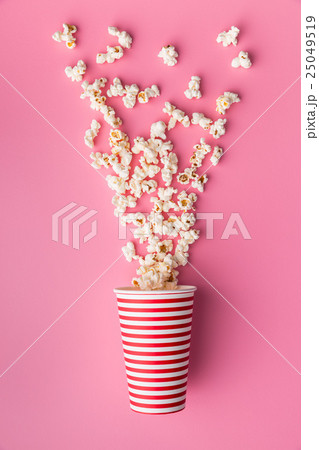 popcorn in paper cup popcorn in paper cup 25049519