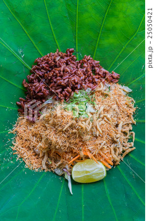Thai Rice Salad with Vegetables on Lotus leaf Thai Rice Salad with Vegetables on Lotus leaf 25050421