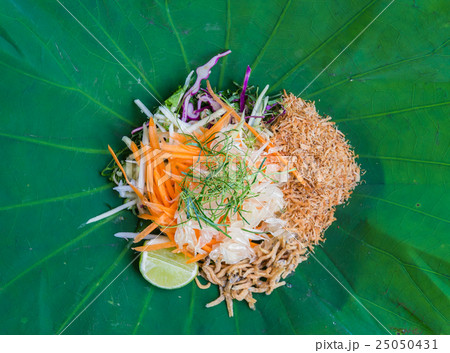 Thai Rice Salad with Vegetables on Lotus leaf Thai Rice Salad with Vegetables on Lotus leaf 25050431