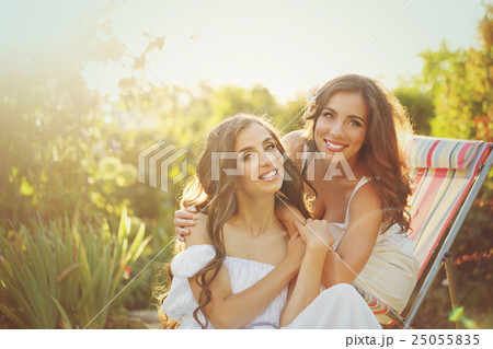 Two sisters portrait. Two sisters portrait. 25055835