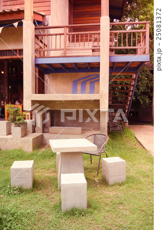 Coffee terrace with tables and chairs 25081372